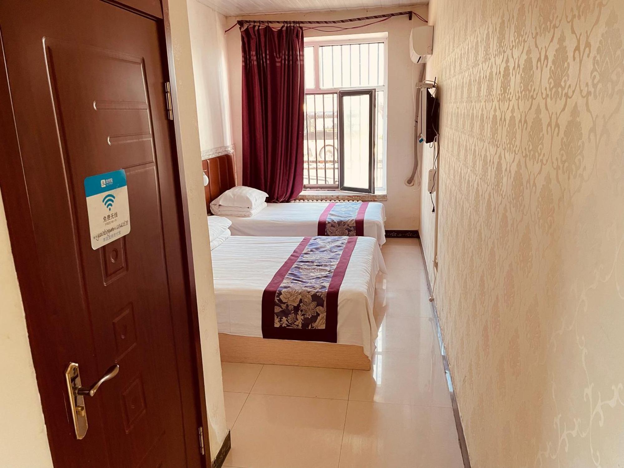 哈尔滨机场东方红运宾馆 Hotel Cameră foto