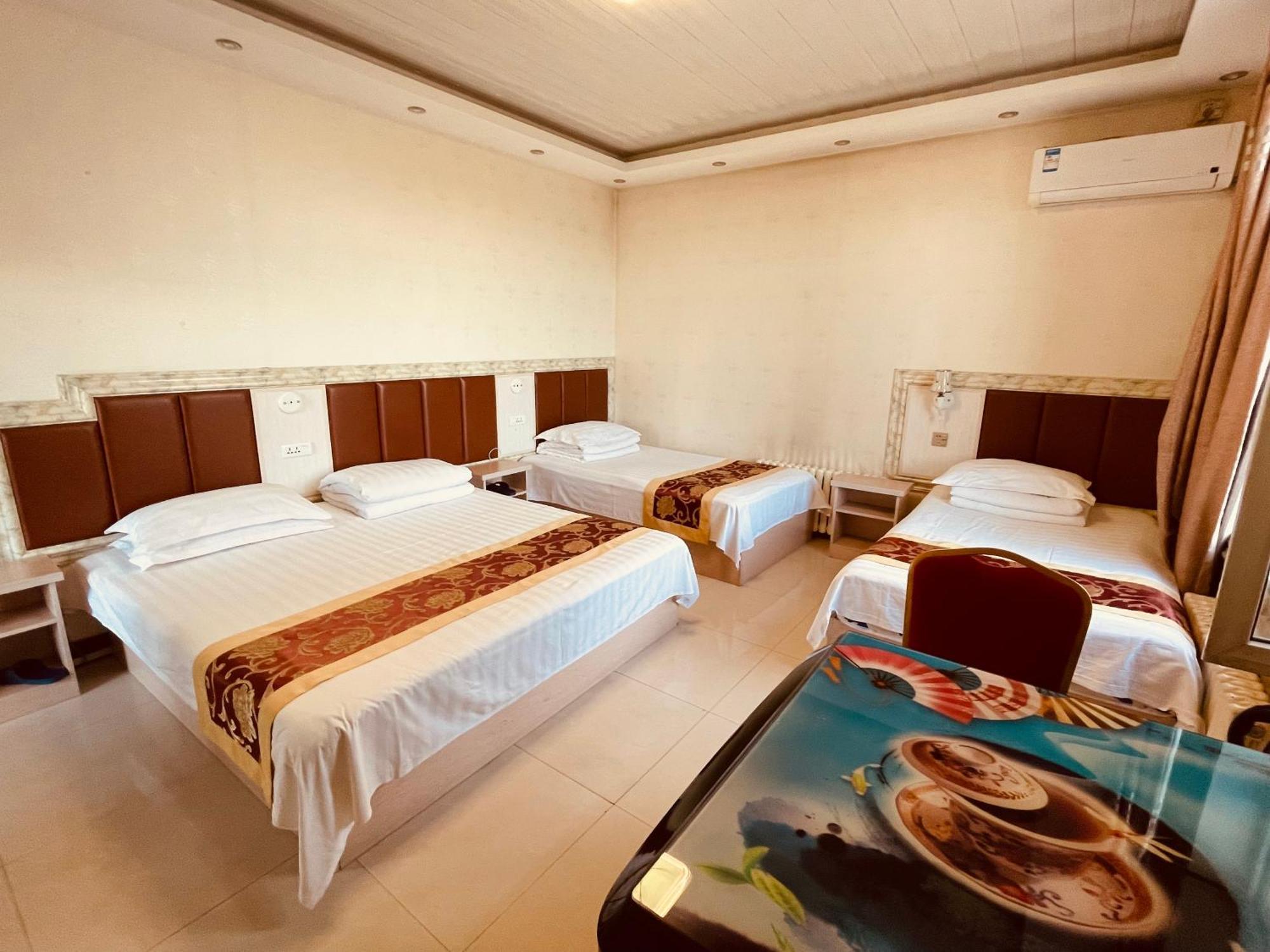 哈尔滨机场东方红运宾馆 Hotel Cameră foto
