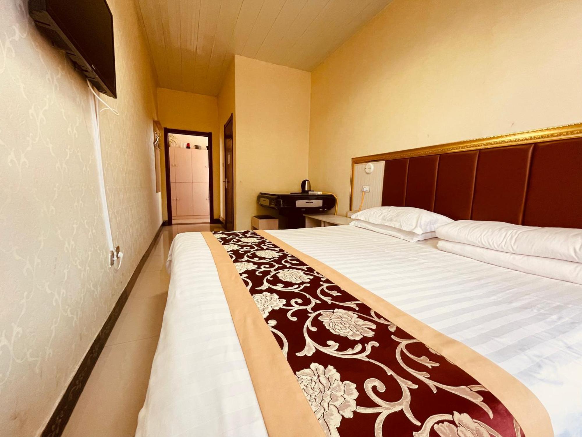 哈尔滨机场东方红运宾馆 Hotel Cameră foto