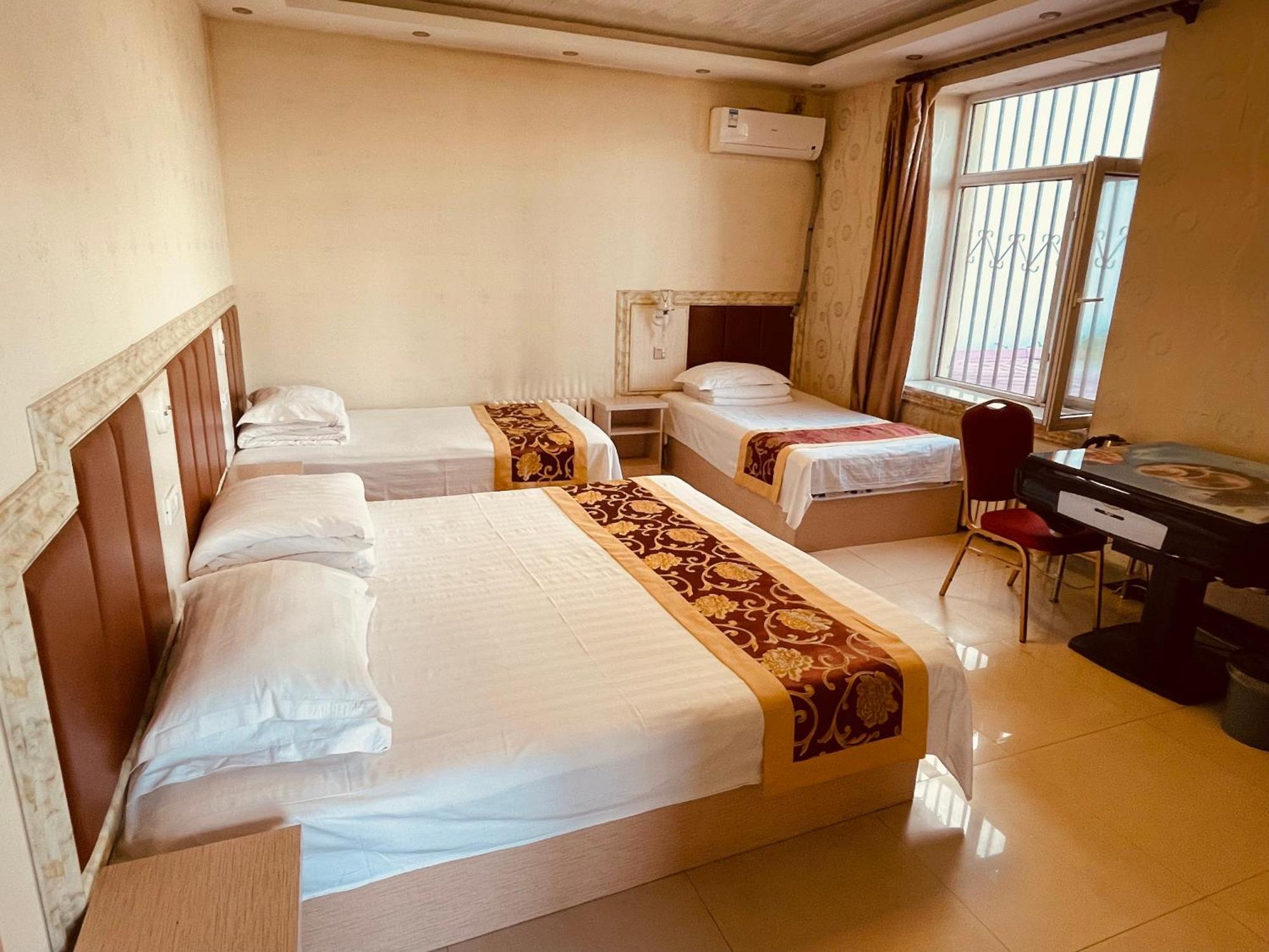 哈尔滨机场东方红运宾馆 Hotel Cameră foto